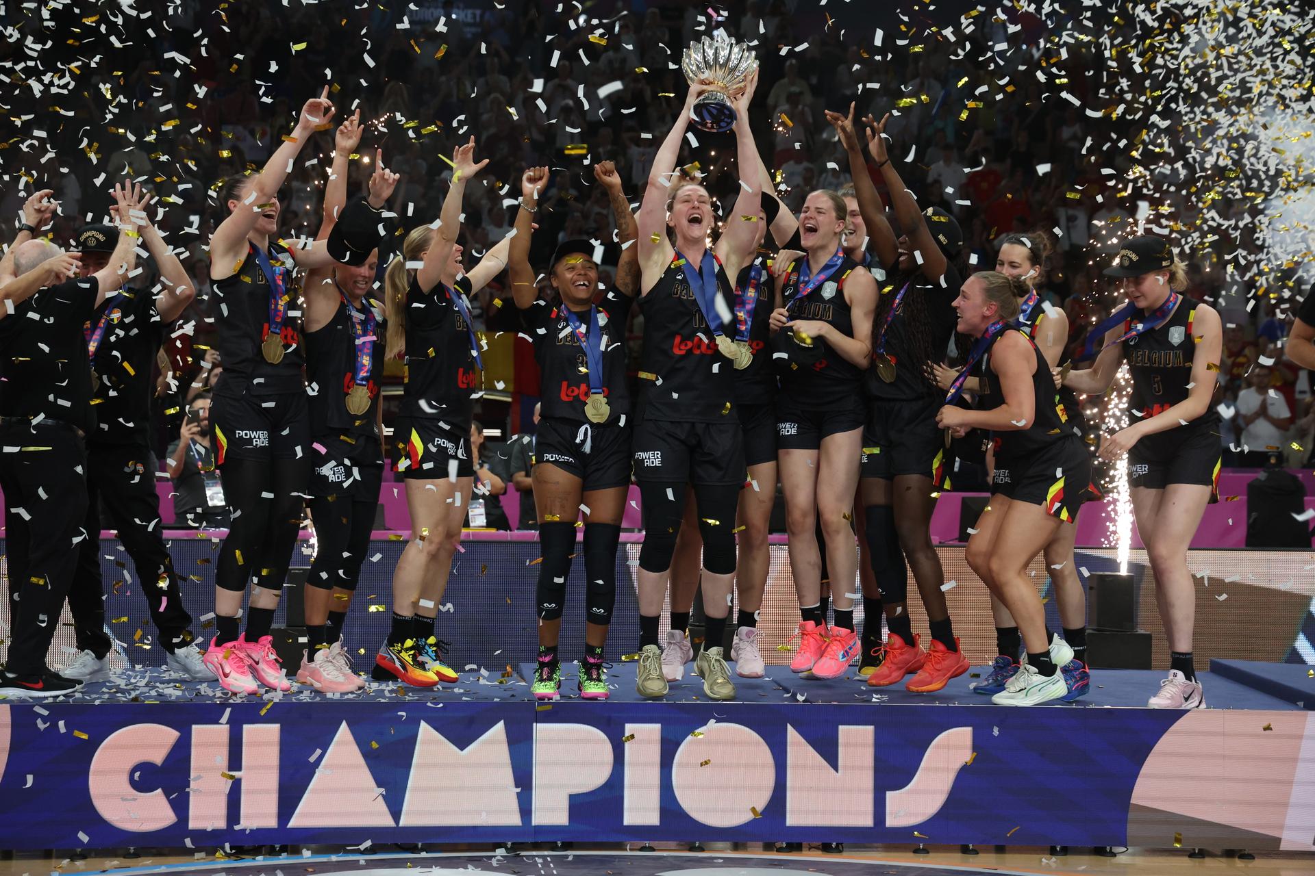 Belgium's captain Emma Meesseman celebrates this the cup on the podium after winning a basketball match between Spain and Belgian national team 'the Belgian Cats' on Sunday 29 June 2025 in Piraeus, Greece, the final of the FIBA Women's EuroBasket 2025. BELGA PHOTO VIRGINIE LEFOUR