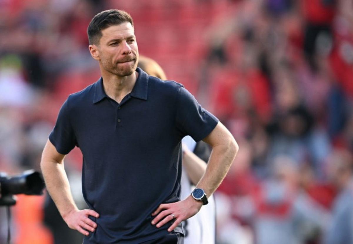 Bayer Leverkusen's Spanish head coach Xabi Alonso reacts after the German first division Bundesliga football match between Bayer Leverkusen and Union Berlin in Leverkusen, western Germany, on April 12, 2025. INA FASSBENDER / AFP