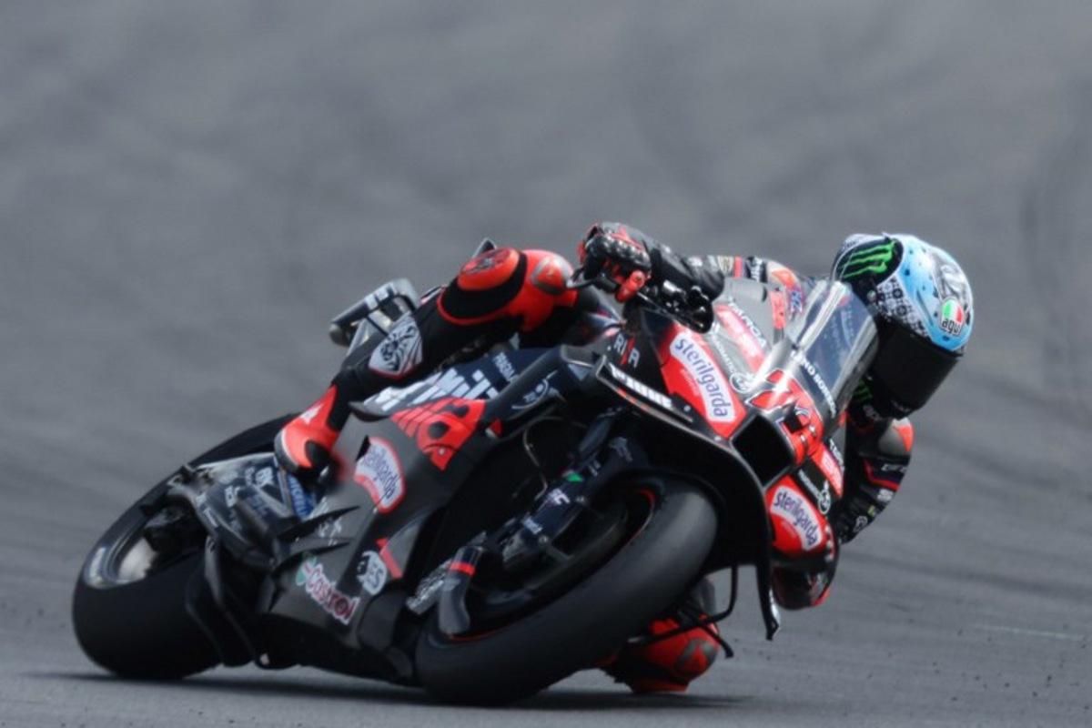 Aprilia Racing team's Italian MotoGP rider Marco Bezzecchi leads during the MotoGP British Grand Prix at Silverstone circuit in Northamptonshire, central England, on May 25, 2025. Adrian Dennis / AFP