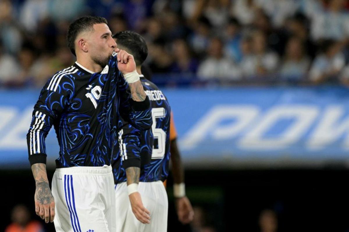 Argentina's defender #19 Nicolas Otamendi celebrates after scoring his team's third goal from the penalty spot during a friendly football match between Argentina and Zambia at La Bombonera stadium in Buenos Aires on March 31, 2026. JUAN MABROMATA / AFP