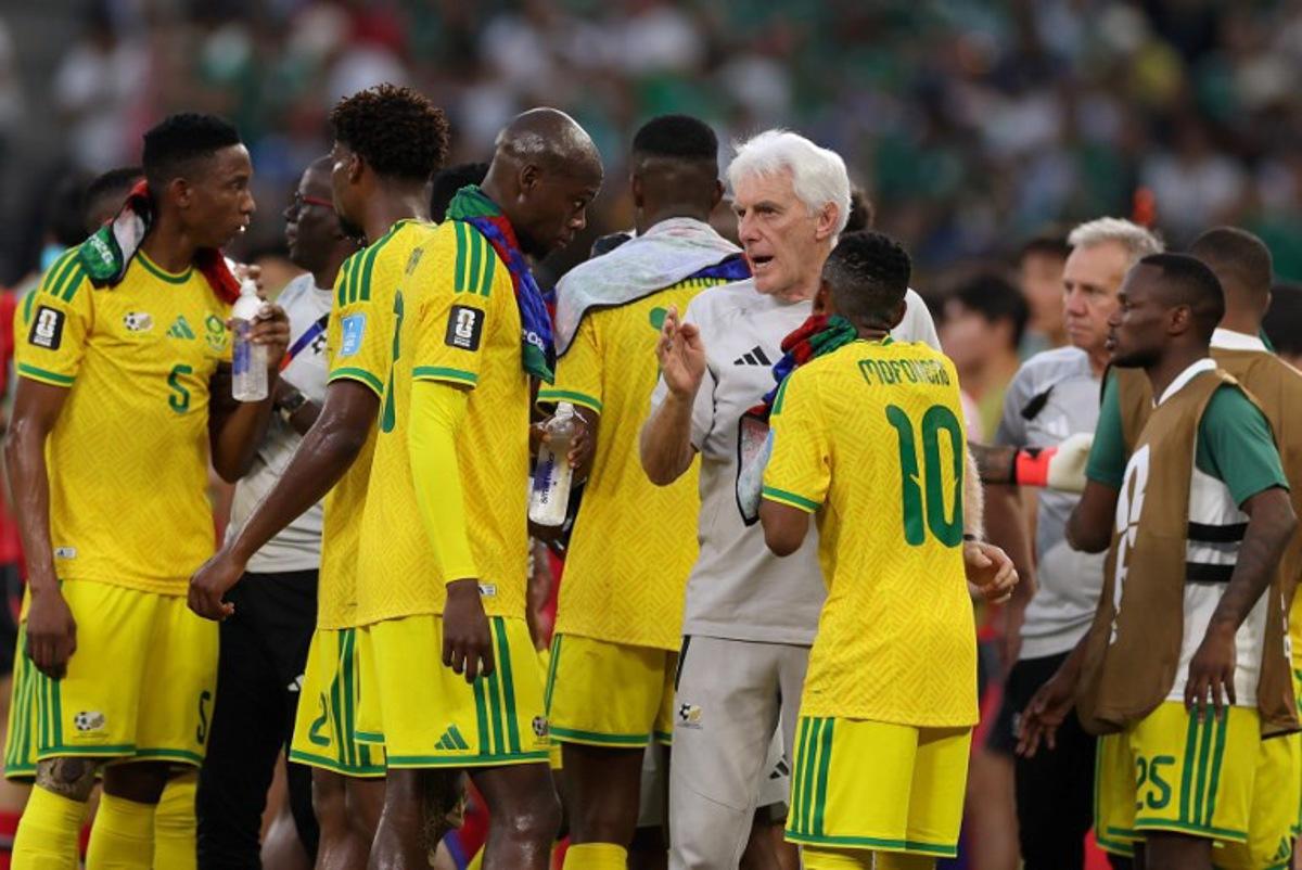 South Africa's Belgian head coach Hugo Broos talks to his players during a hydration break of the 2026 World Cup Group A football match between South Africa and South Korea at the Monterrey Stadium in Guadalupe, Mexico, on June 24, 2026. Julio Cesar AGUILAR / AFP