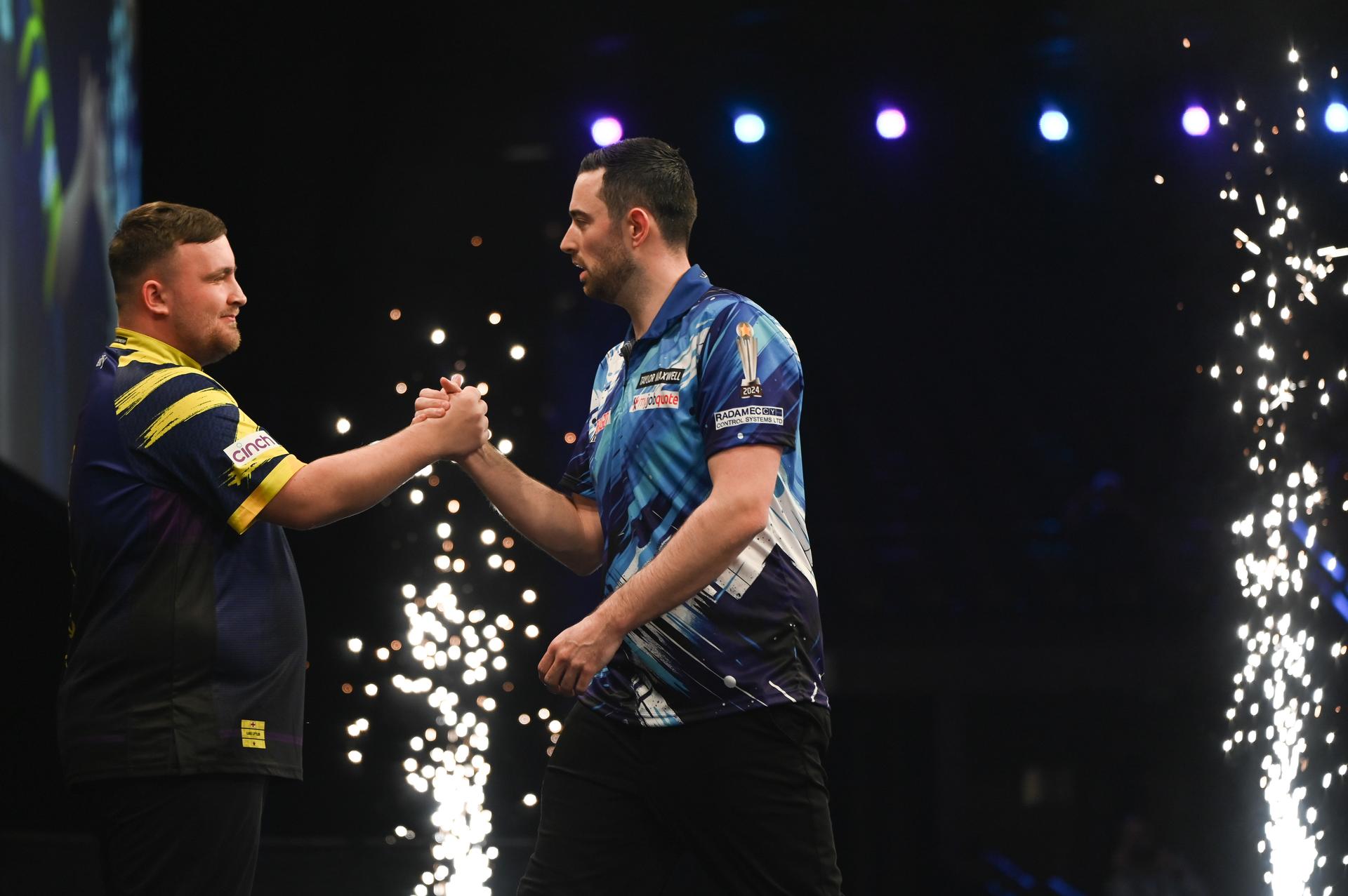 English Luke Littler and English Luke Humphries shake hands at the Premier League (Night 2/16) darts event in Antwerp on Thursday 12 February 2026. BELGA PHOTO ELIAS ROM