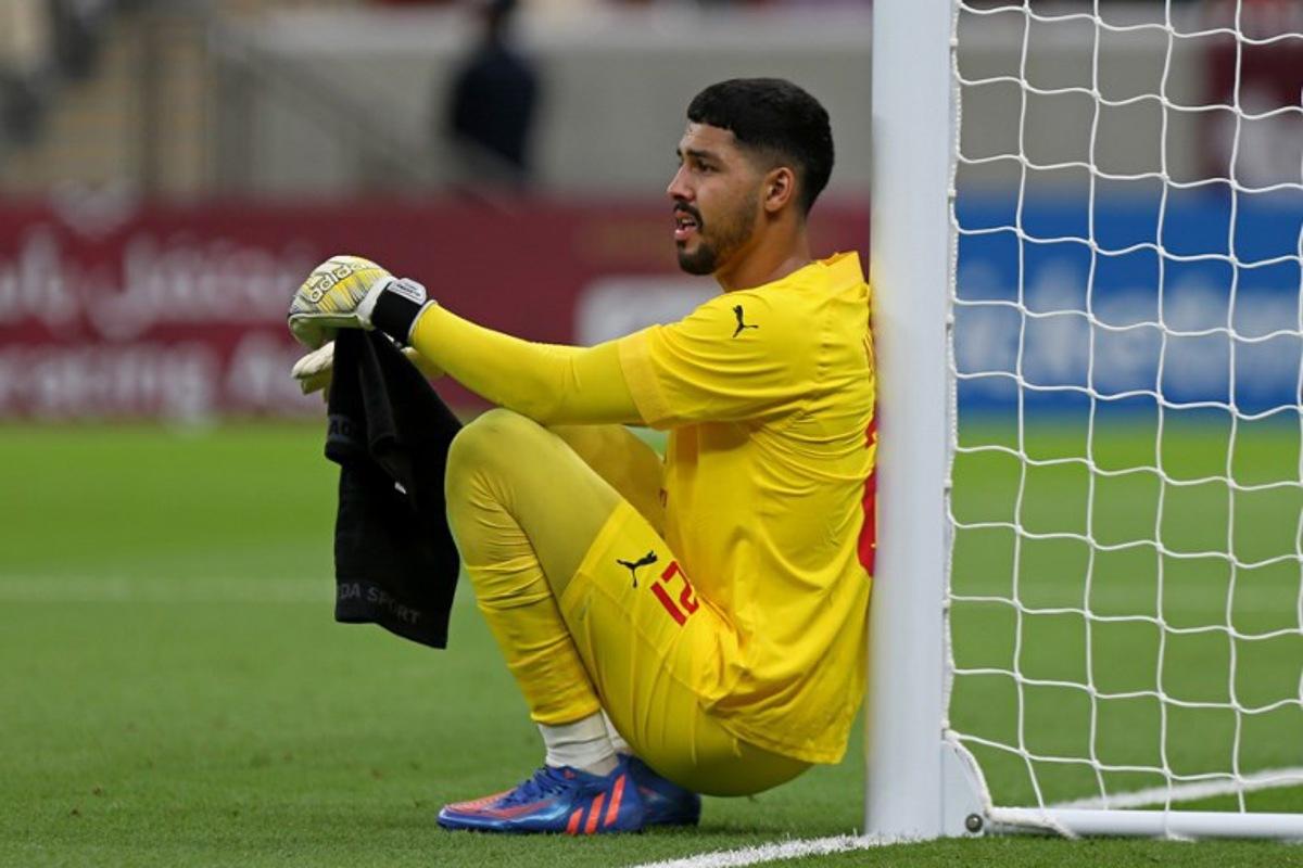 Arabi's goalkeeper Mahmoud Abunada reacts during the Qatar Stars League match between Al-Arabi and Al-Rayyan at the Lusail stadium, on the outskirts of the capital Doha on August 11, 2022. Mustafa ABUMUNES / AFP