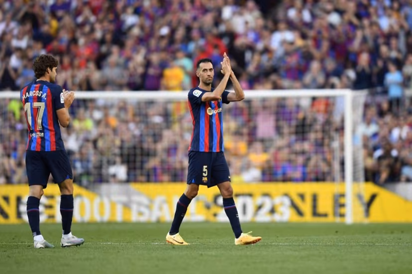 Barcelona's Spanish midfielder Sergio Busquets applauds as he leaves the pitch during the Spanish league football match between FC Barcelona and RCD Mallorca at the Camp Nou stadium in Barcelona on May 28, 2023. Sergio Busquets leaves Barcelona, ending a highly successful era at the club. The 34-year-old was a central figure in Barcelona's golden era winning a host of trophies including the Champions League three times. Pau BARRENA / AFP