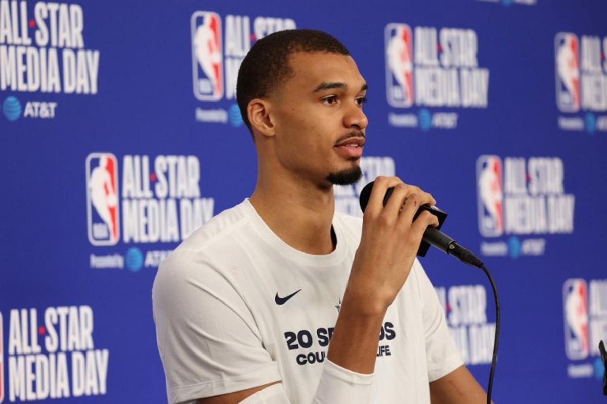 French basketball player Victor Wembanyama of the San Antonio Spurs speaks to the media during the NBA All-Star media day at the Intuit Dome in Inglewood, California, on February 14, 2026. Patrick T. Fallon / AFP