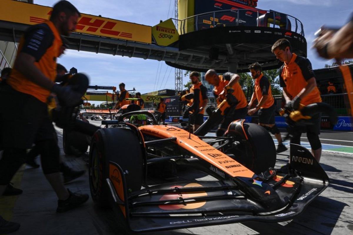 Team mechanics intervene on McLaren's British driver Lando Norris' car in the pit during the third practice session ahead of the Italian Formula One Grand Prix at the Autodromo Nazionale Monza circuit, in Monza, northern Italy, on September 6, 2025. Philippe Lopez / AFP