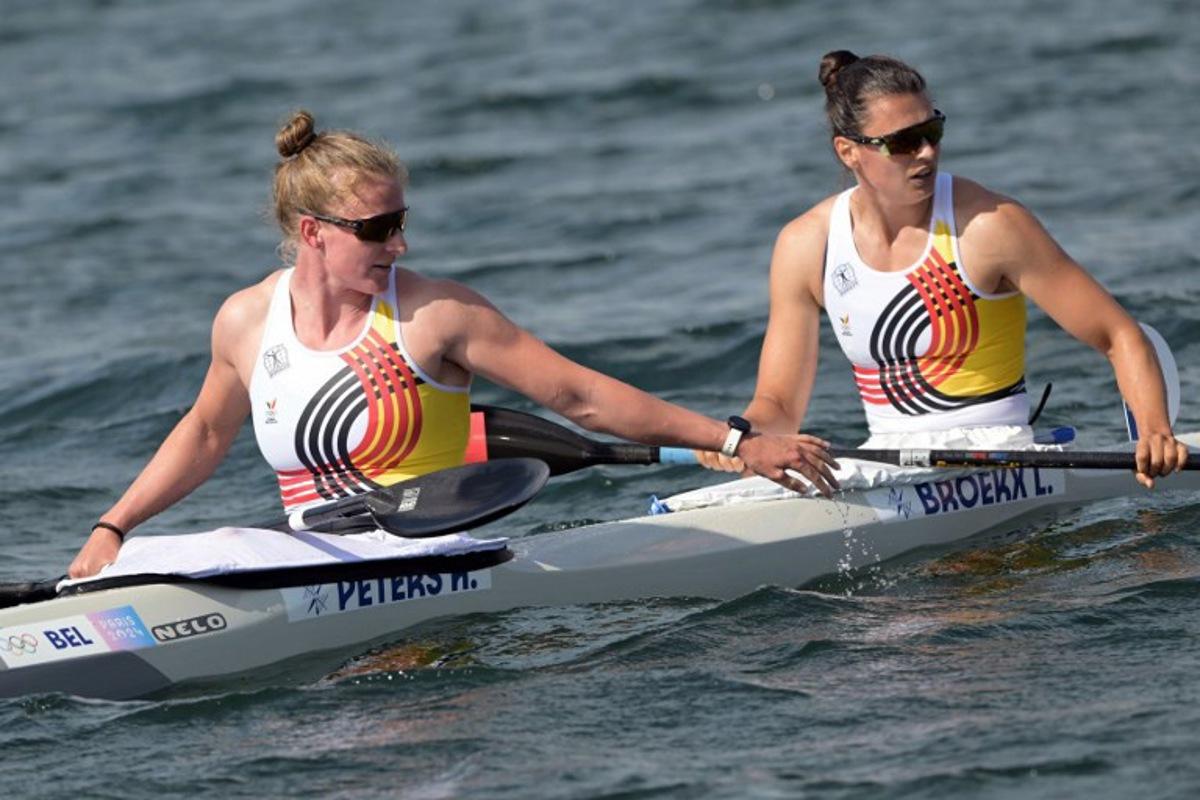 Belgium's Hermien Peters (L) and Belgium's Lize Broekx react after competing in the women's kayak double 500m semifinal of the canoe sprint competition at Vaires-sur-Marne Nautical Stadium in Vaires-sur-Marne during the Paris 2024 Olympic Games on August 9, 2024. Bertrand GUAY / AFP