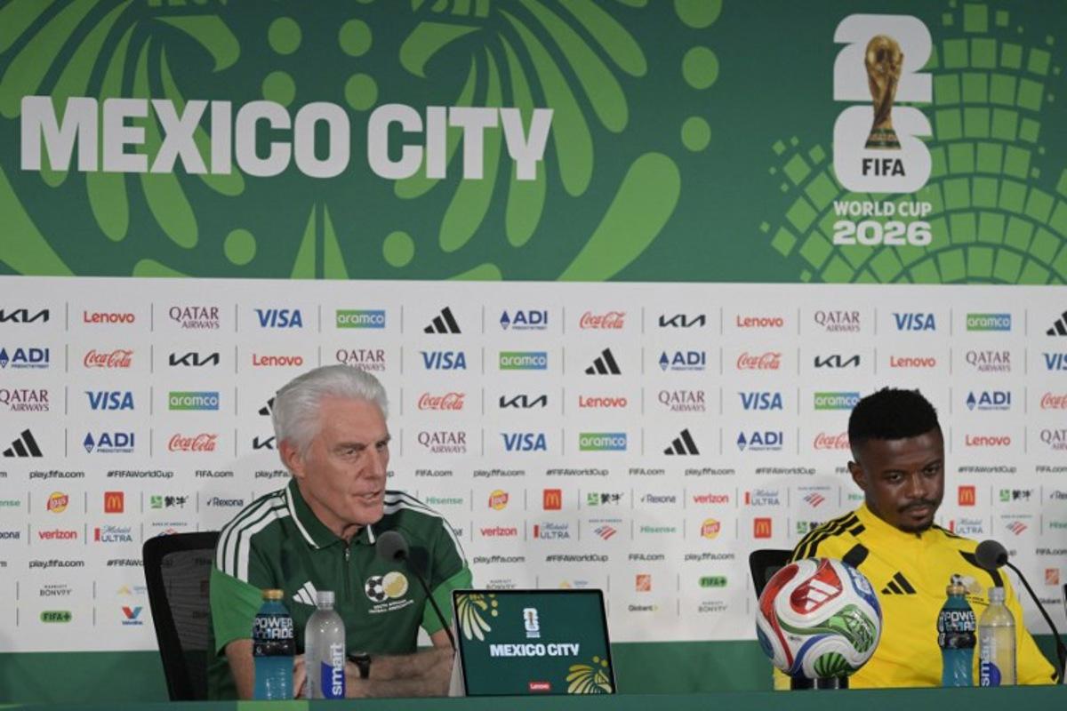 South Africa's Belgian head coach Hugo Broos (L) and midfielder Teboho Mokoena (R) give a press conference at the Mexico City Stadium in Mexico City on June 10, 2026, on the eve of the 2026 World Cup football match between Mexico and South Africa. Alfredo ESTRELLA / AFP