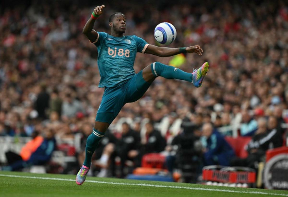 Bournemouth's Burkinabe striker #11 Dango Ouattara controls the ball during the English Premier League football match between Arsenal and Bournemouth at the Emirates Stadium in London on May 3, 2025. Glyn KIRK / AFP