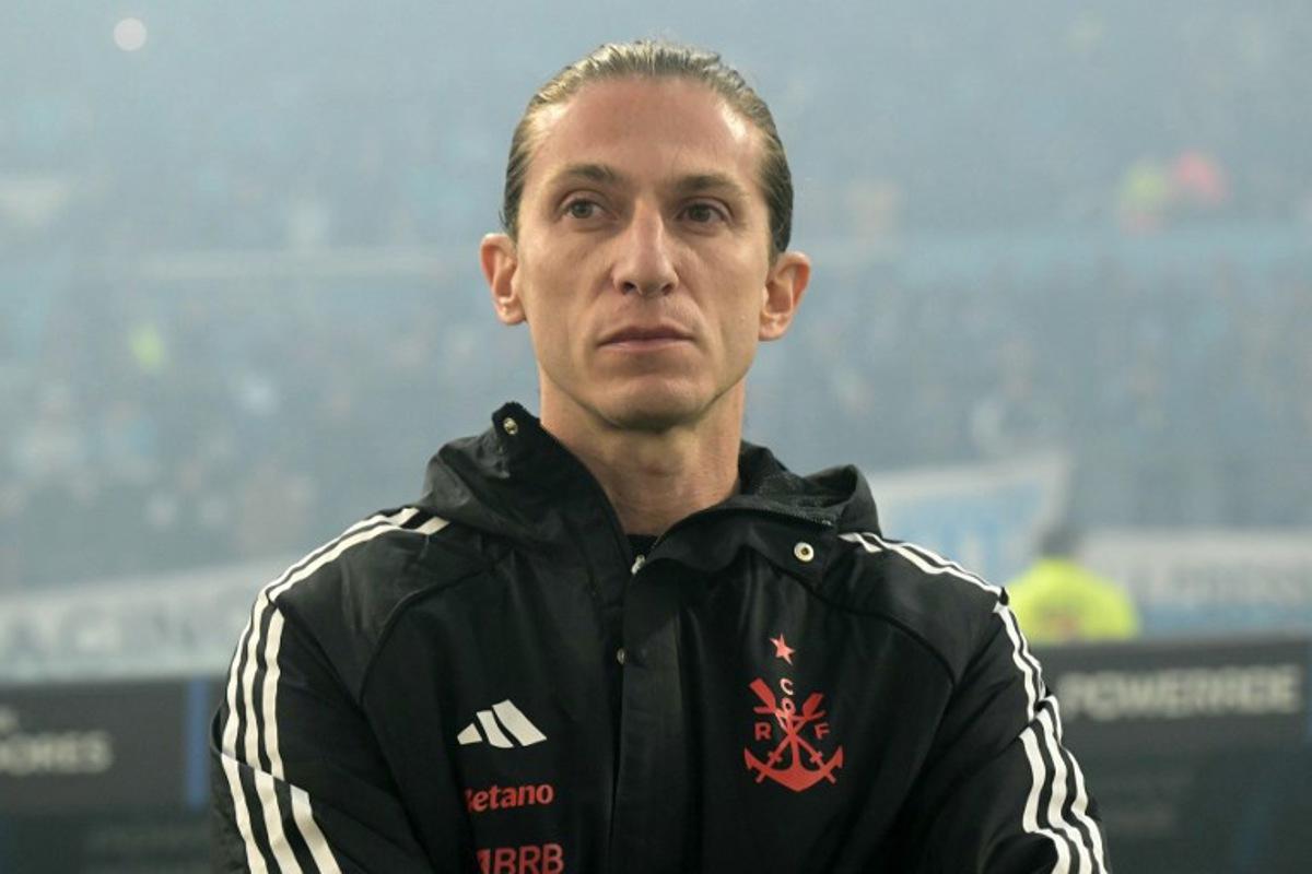Flamengo's head coach Filipe Luis looks on ahead of the Copa Libertadores semifinal second leg football match between Argentina's Racing and Brazil's Flamengo at the Presidente Juan Domingo Peron - El Cilindro stadium in Avellaneda, Buenos Aires province, on October 29, 2025. JUAN MABROMATA / AFP