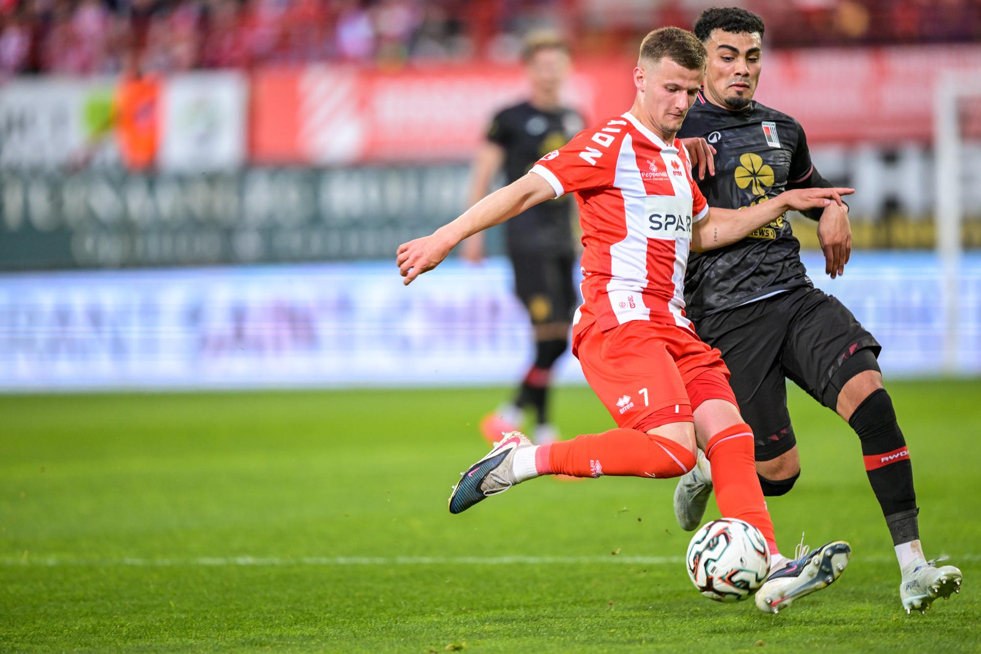 Kortrijk's Ilan Hurtevent and Rwdm's Ali Loune fight for the ball during a soccer game between KV Kortrijk and RWDM Brussels, Friday 17 April 2026 in Kortrijk, on day 34 of the 2025-2026 'Challenger Pro League' 1B second division of the Belgian championship. BELGA PHOTO DAVID PINTENS