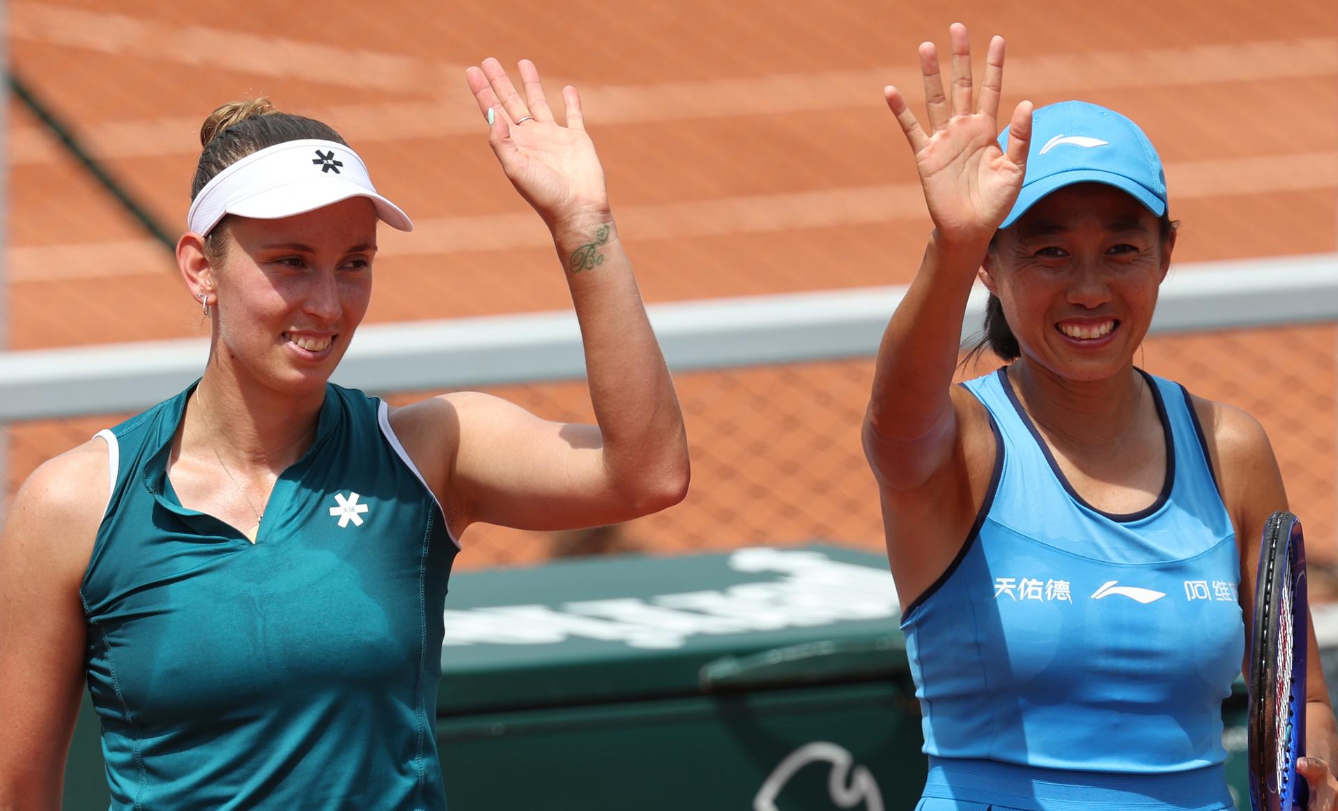 Belgian Elise Mertens and Chinese Zhang Shuai celebrate after winning a doubles tennis match between Argentinian-German pair Fossa Huergo-Korpatsch and Belgian-Chinese pair Zhang-Mertens, in the second round of the women's doubles at the Roland Garros French Open tennis tournament, in Paris, France, Saturday 30 May 2026. This year's tournament takes place from 18 May to 07 June. Mertens-Shuai won 6-1, 6-1. BELGA PHOTO VIRGINIE LEFOUR