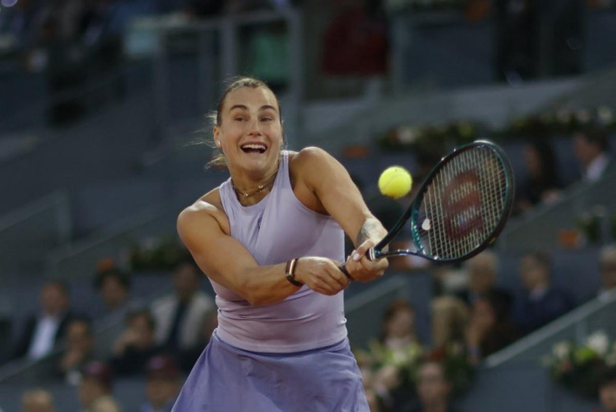 Belarus' Aryna Sabalenka returns a ball to Ukraine's Marta Kostyuk during their 2025 WTA Tour Madrid Open tennis tournament quarter finals singles match at the Caja Magica in Madrid, on April 30, 2025. OSCAR DEL POZO / AFP