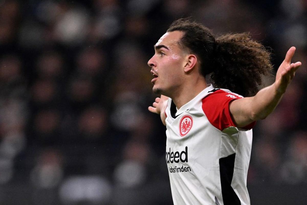 Frankfurt's Belgian defender #03 Arthur Theate reacts during the German first division Bundesliga football match between Eintracht Frankfurt and Mainz 05 in Frankfurt on December 21, 2024. Kirill KUDRYAVTSEV / AFP