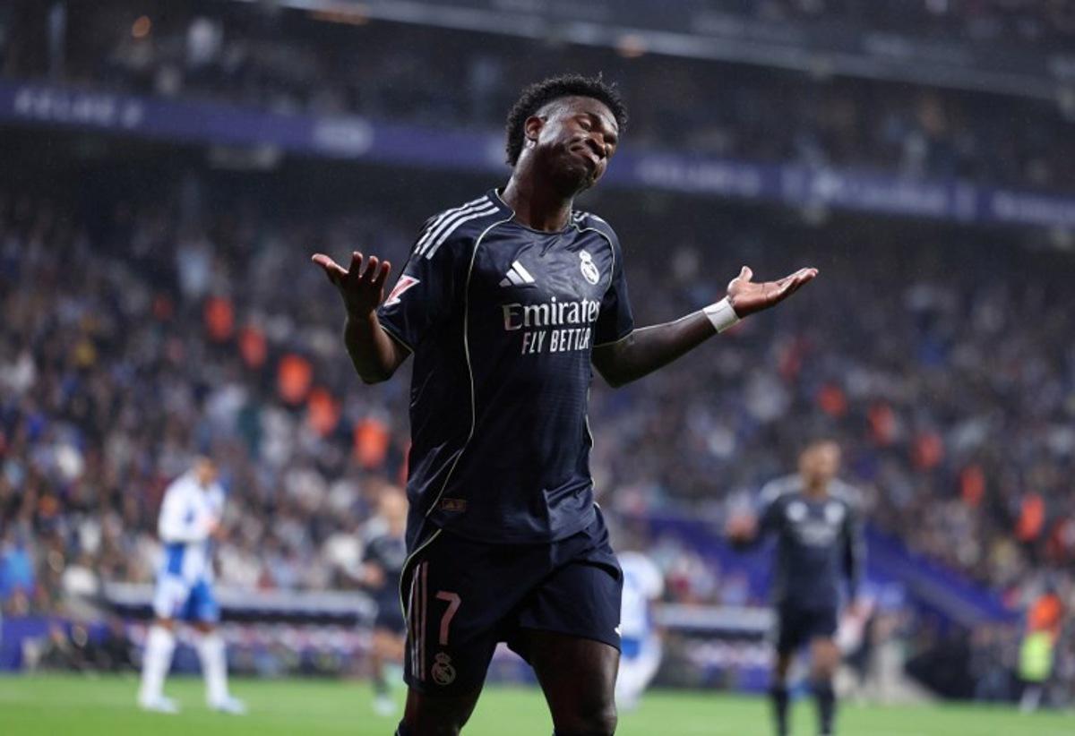 Real Madrid's Brazilian forward #07 Vinicius Junior reacts during the Spanish league football match between RCD Espanyol and Real Madrid CF at RCDE Stadium in Cornella de Llobregat on May 3, 2026. Josep LAGO / AFP