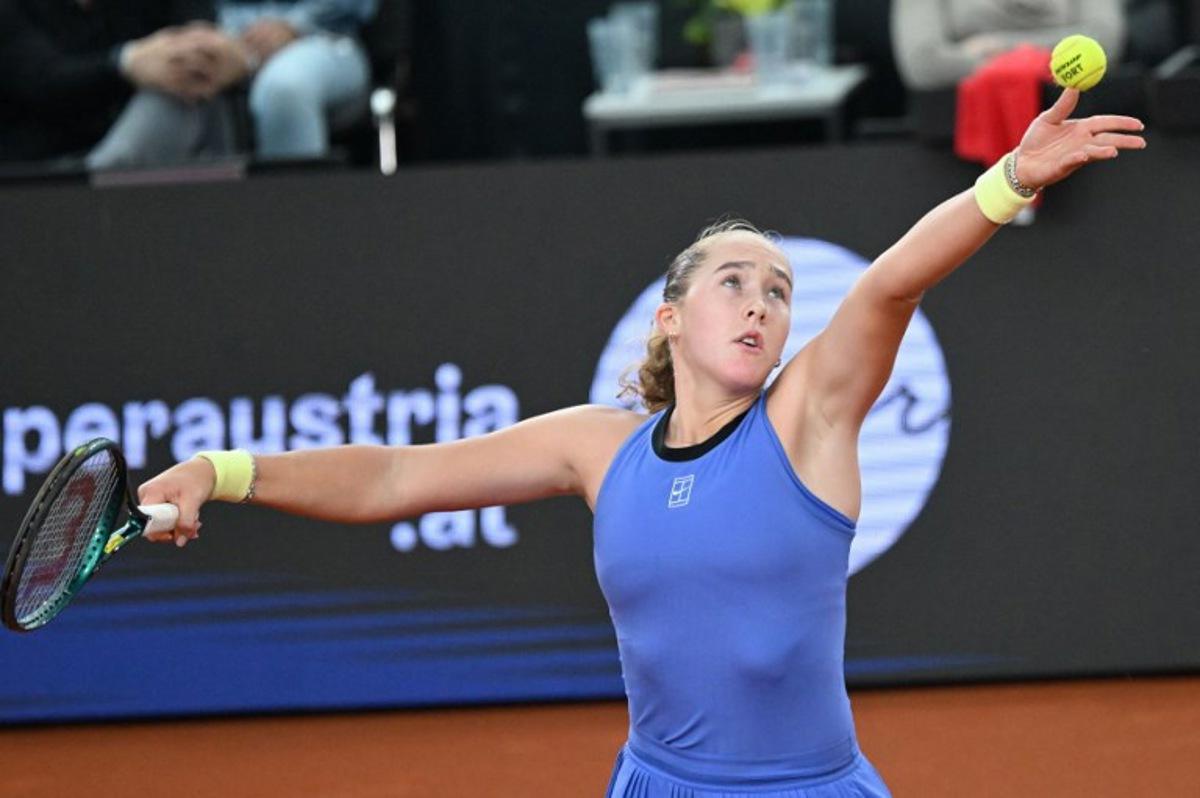 Mirra Andreeva serves the ball to Austria's Anastasia Potapova (not pictured) during their women's single final match of the WTA Upper Austria Women's Linz tennis tournament in Linz, Austria on April 12, 2026. BARBARA GINDL / APA / AFP