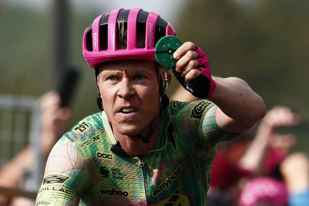 EF Education - EasyPost Danish rider Michael Valgren celebrates as he crosses the finish line to win the 17th stage of the Giro d'Italia 2026 - Tour of Italy cycling race between Cassano d'Adda and Andalo, Italy, on May 27, 2026. Luca Bettini / AFP
