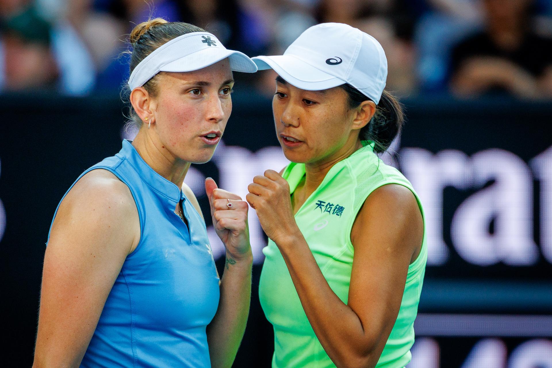 Belgian Elise Mertens and Chinese Tianhui Zhang pictured during during a second round match of Belgium-China's Mertens-Zhang pair against American-Canadian's pair Jovic-Mboko in the women doubles at the Australian Open, Melbourne Park, Melbourne on Sunday 25 January 2026. Mertens - Zhang won the game. BELGA PHOTO PATRICK HAMILTON --- BENELUX ONLY ---