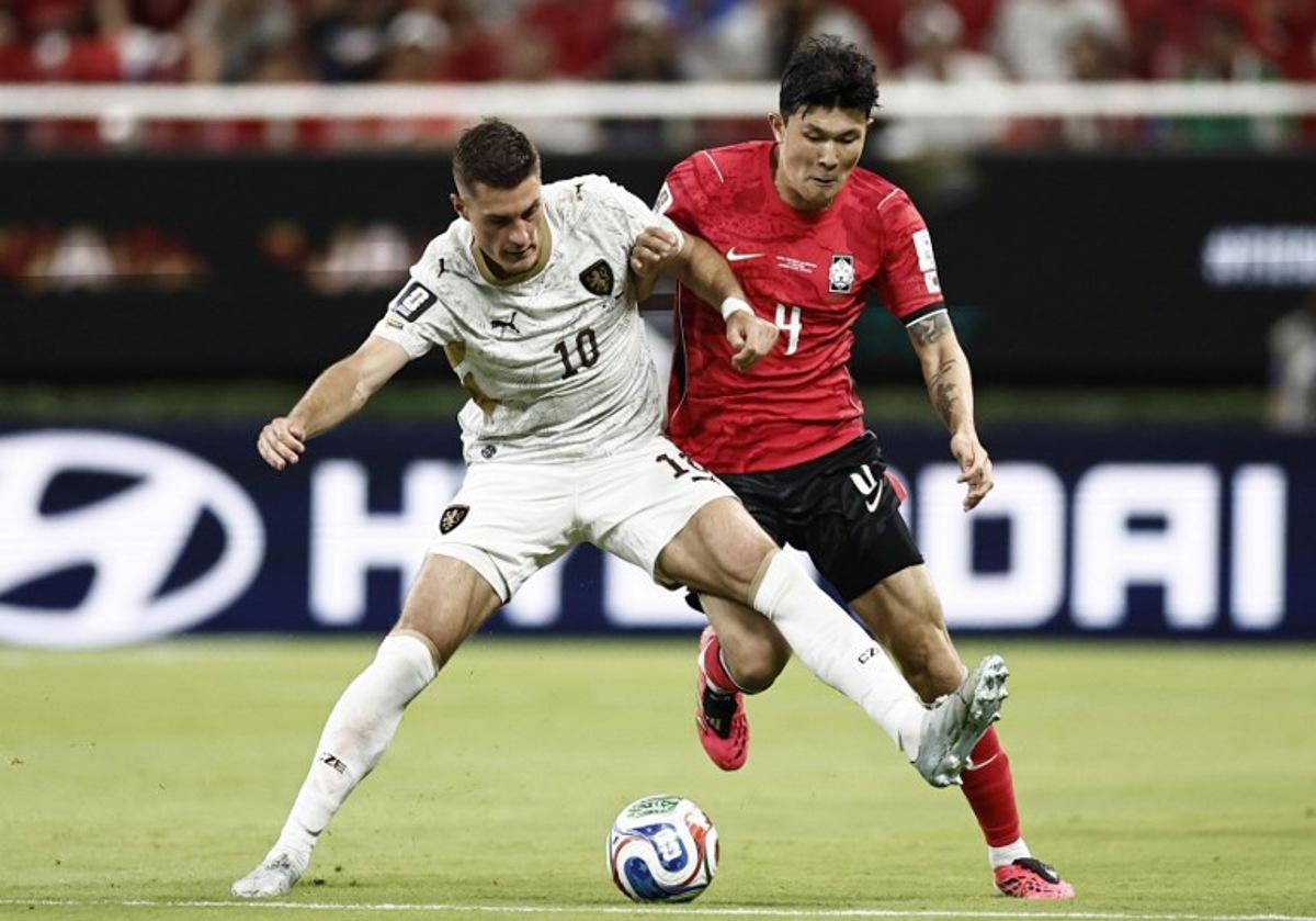 Czech Republic's forward #10 Patrik Schick and South Korea's defender #04 Kim Min-jae fight for the ball during the 2026 World Cup Group A football match between South Korea and the Czech Republic at the Guadalajara Stadium in Zapopan on June 11, 2026. Ulises RUIZ / AFP
