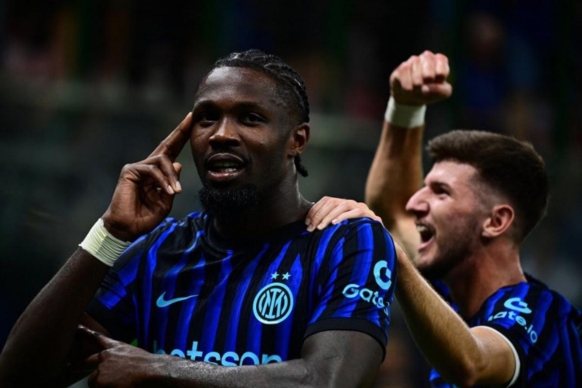 Inter Milan's French forward #09 Marcus Thuram celebrates after scoring his team's second goal during the Italian Serie A football match between Inter Milan and Torino at the San Siro Stadium in Milan, on August 25, 2025. Piero CRUCIATTI / AFP