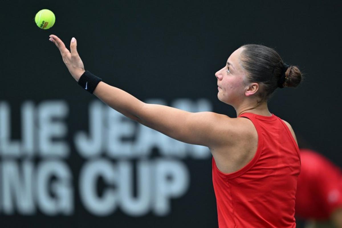Belgium's Sofia Costoulas serves to China's Wang Xiyu during their women's singles match at the Billie Jean King Cup tennis play-offs at the Guangzhou Nansha International Tennis Center in Guangzhou, in south China's Guangdong province on November 17, 2024. STR / AFP
