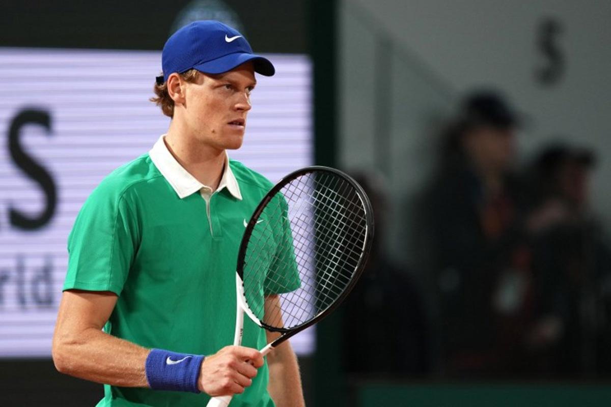 Italy's Jannik Sinner reacts during his men's singles match against France's Arthur Rinderknech on day 2 of the French Open tennis tournament on Court Philippe-Chatrier at the Roland-Garros Complex in Paris on May 26, 2025. Dimitar DILKOFF / AFP
