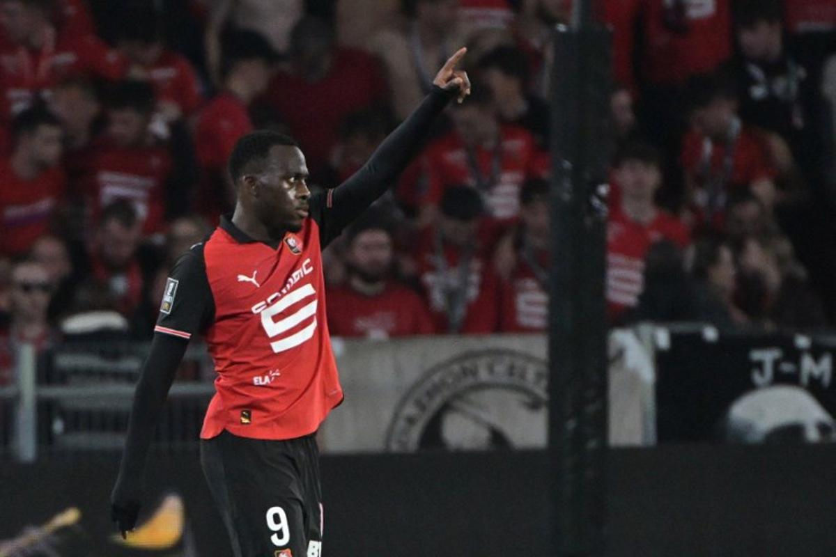Rennes' French forward #09 Arnaud Kalimuendo celebrates after scoring during the French L1 football match between Stade Rennais FC and OGC Nice at Roazhon Park stadium in Rennes, western France on May 10, 2025. DAMIEN MEYER / AFP