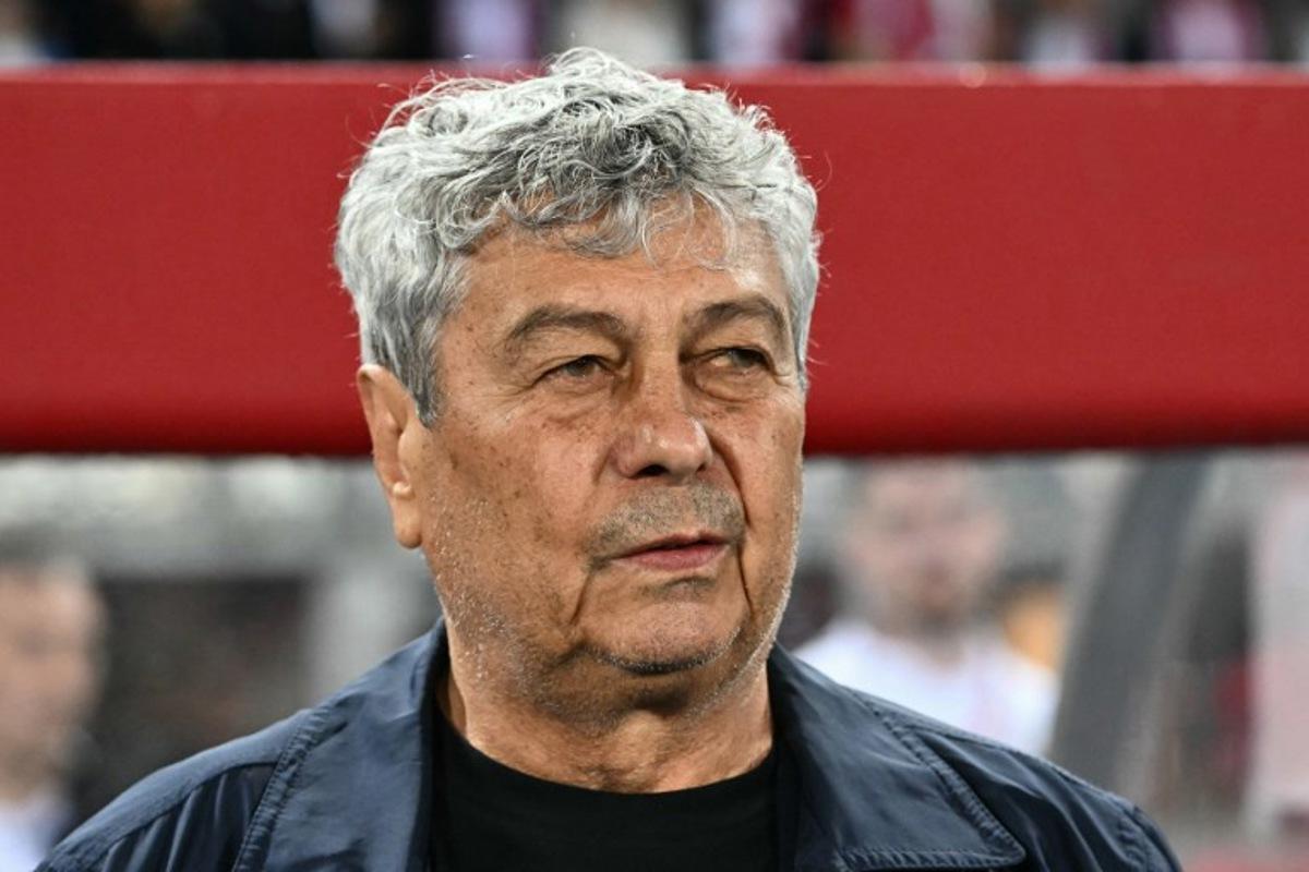 Romania's head coach Mircea Lucescu is pictured prior to the 2026 FIFA World Cup Qualifying Group H football match between Austria and Romania in Vienna on June 7, 2025. Joe Klamar / AFP