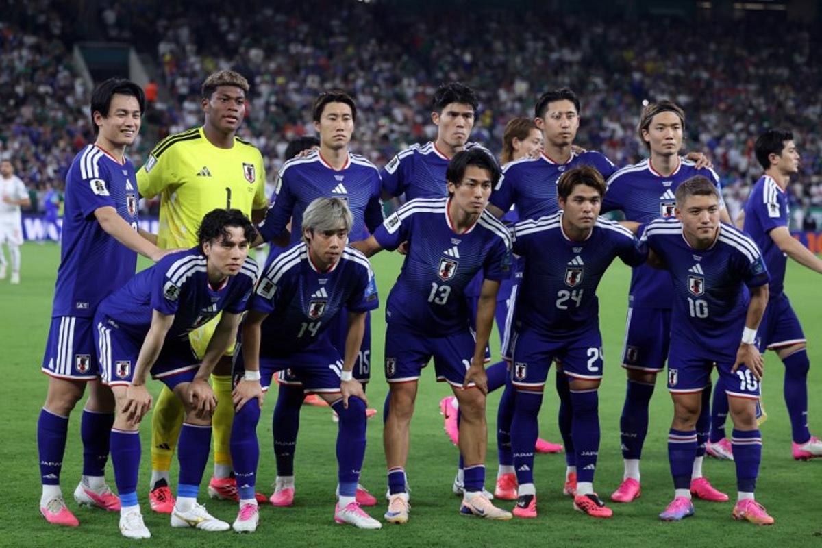 Japanese players pose for a team photo before the start of the 2026 World Cup Group F football match between Tunisia and Japan at the Monterrey Stadium in Guadalupe, Mexico, on June 20, 2026. Julio Cesar AGUILAR / AFP