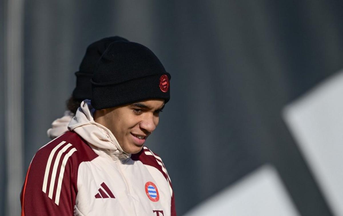 Bayern Munich's German midfielder #42 Jamal Musiala arrives for a training session on the eve of the UEFA Champions League Knockout round play-off second Leg match against Celtic on February 17, 2025 in in Munich. Tobias Schwarz / AFP