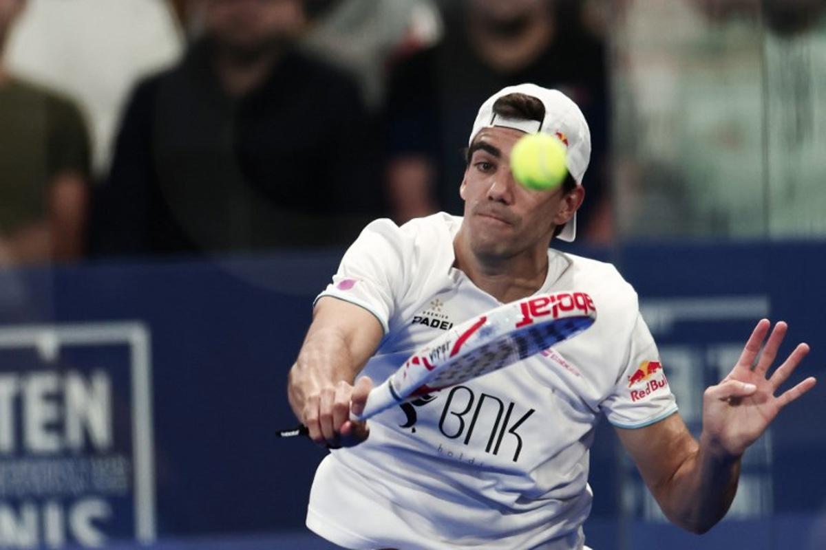 Spain's Juan Lebron plays with Argentina's Franco Stupaczuk (not seen) against Spain's Arthuro Coello and Argentina's Augustin Tapia during the men's semi-final match of the Paris Major Premier Padel tournament on Court Philippe-Chatrier at the Roland-Garros Complex in Paris on September 13, 2025. Thibaud MORITZ / AFP