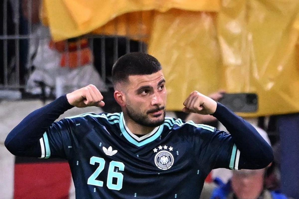 Germany's forward #26 Deniz Undav celebrates scoring his team's first goal during a friendly match between Germany and Finland ahead of the 2026 FIFA World Cup football tournament, in Mainz, western Germany on May 31, 2026. Kirill KUDRYAVTSEV / AFP