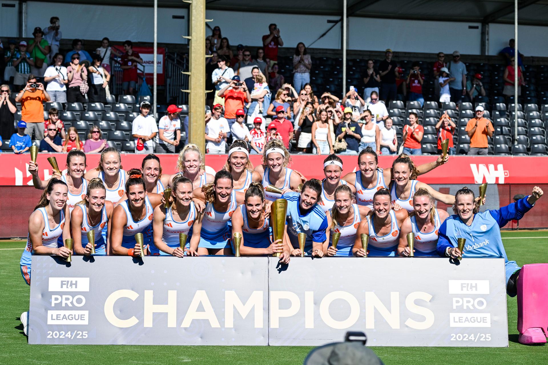 The Netherlands players celebrate with the FIH Trophy after a hockey game between Belgian national team Red Panthers and The Netherlands, match 16/16 in the group stage of the 2025 women's FIH Pro League, Sunday 29 June 2025 in Antwerp. BELGA PHOTO TOM GOYVAERTS