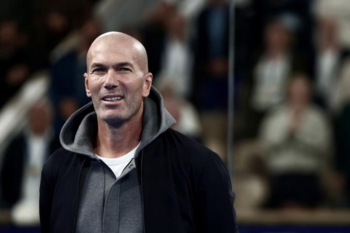 French football legend and coach Zinedine Zidane attends the podium ceremony of the women's Paris Major Premier Padel tournament after the final match on Court Philippe-Chatrier at the Roland-Garros Complex in Paris on September 14, 2025. Thibaud MORITZ / AFP
