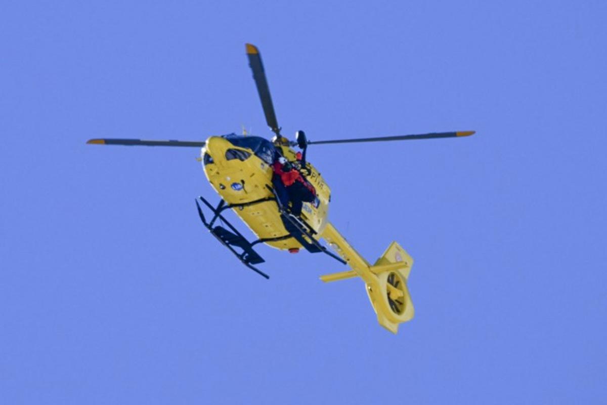 A medical helicopter evacuates US' Lindsey Vonn after she crashed in the women's downhill event during the Milano Cortina 2026 Winter Olympic Games at the Tofane Alpine Skiing Centre in Cortina d'Ampezzo on February 8, 2026. Stefano RELLANDINI / AFP