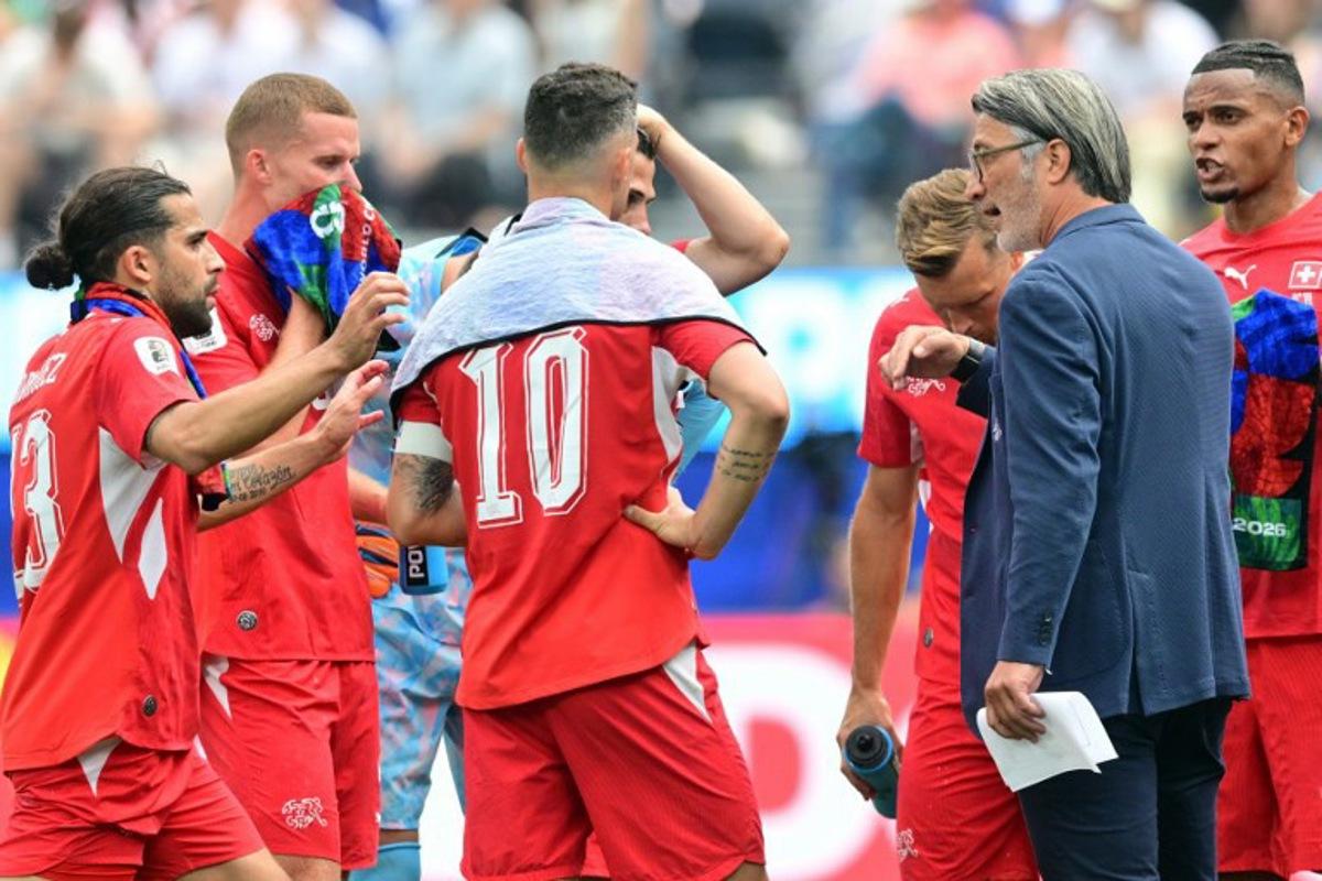 Switzerland's head coach Murat Yakin speaks to his players during the 2026 World Cup Group B football match between Switzerland and Bosnia and Herzegovina at Los Angeles Stadium in Inglewood on June 18, 2026. Frederic J. Brown / AFP