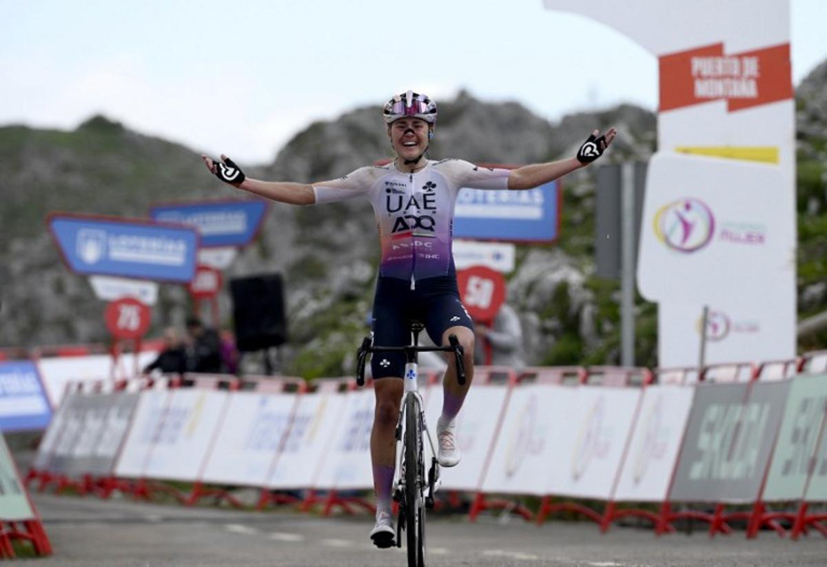 Overall leader team UAE ADQ's Spanish rider Paula Blasi Cairol celebrates winning the 2026 La Vuelta Femenina cycling tour of Spain, at Alto de l'Angliru, on May 9, 2026. Miguel RIOPA / AFP