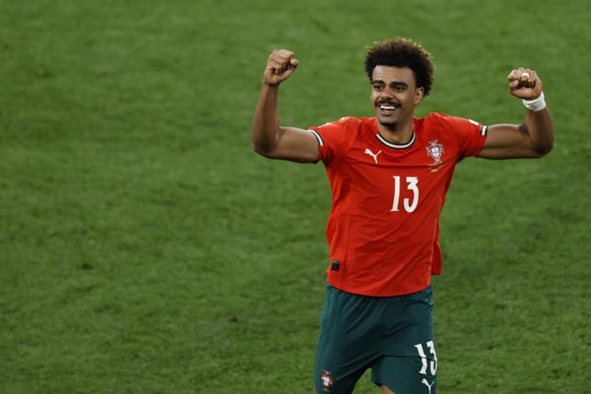 Portugal's midfielder #13 Renato Veiga celebrates after winning the UEFA Nations League final football match between Portugal and Spain in Munich, southern Germany on June 8, 2025. Alexandra BEIER / AFP