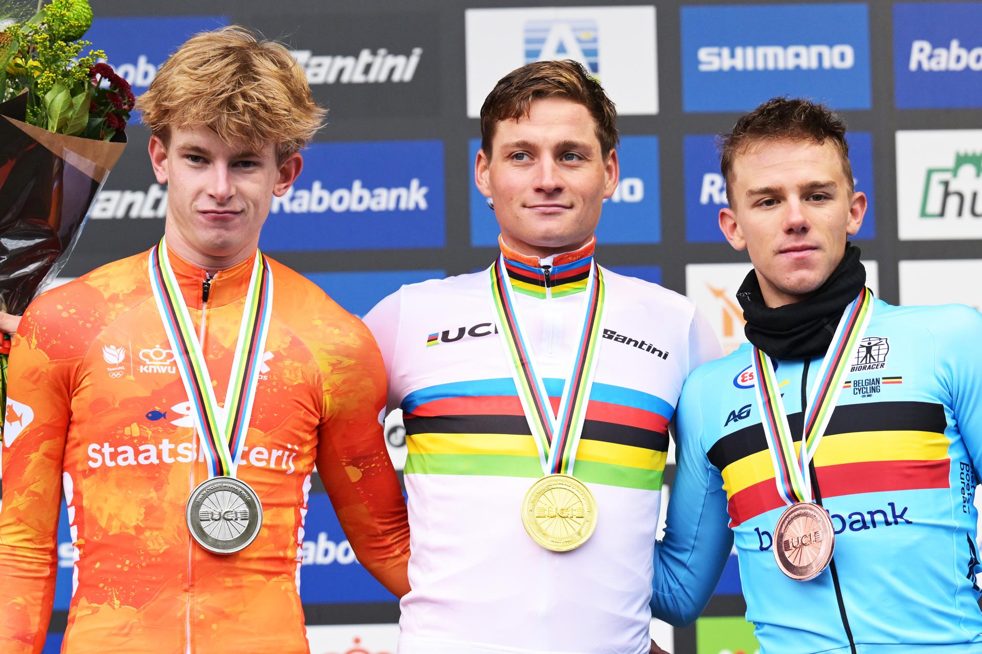 Dutch Tibor Del Grosso, Dutch Mathieu van der Poel and Belgian Thibau Nys celebrate on the podium after the men elite race at UCI Cyclocross World Championships, on Sunday 01 February 2026, in Hulst, The Netherlands. BELGA PHOTO DAVID PINTENS