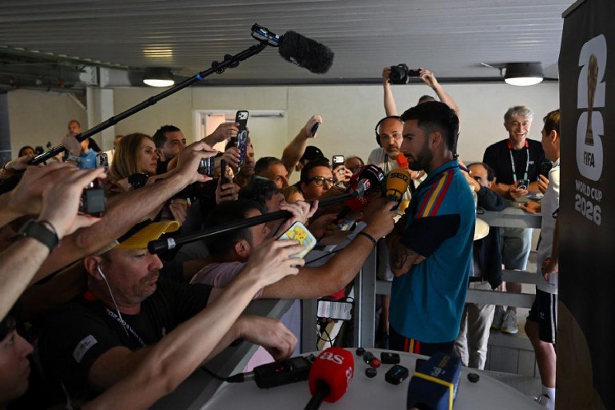 Spain's midfielder #15 Alex Baena gives an MD-1 press conference at the Dallas Stadium in Arlington on July 13, 2026, on the eve of the 2026 World Cup football tournament semi-final match between France and Spain. MAURO PIMENTEL / AFP