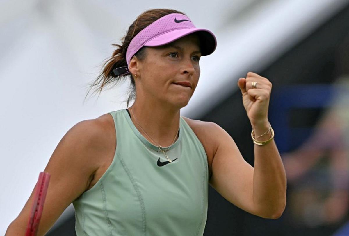 Germany's Tatjana Maria celebrates winning a game in the second set Latvia's Jelena Ostapenko during their women's semi-final tennis match on day five of the Lexus Eastbourne Open at Devonshire Park, Eastbourne, on the south coast of England on June 26, 2026. Glyn KIRK / AFP