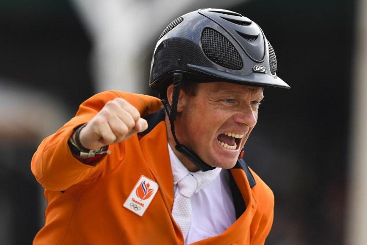 Netherlands's Willem Greve reacts as he rides his horse Carambole during the Longines FEI Jumping Nations Cup Final at the Olympic arena of the Real Club de Polo of Barcelona on October 3, 2021. Pau BARRENA / AFP
