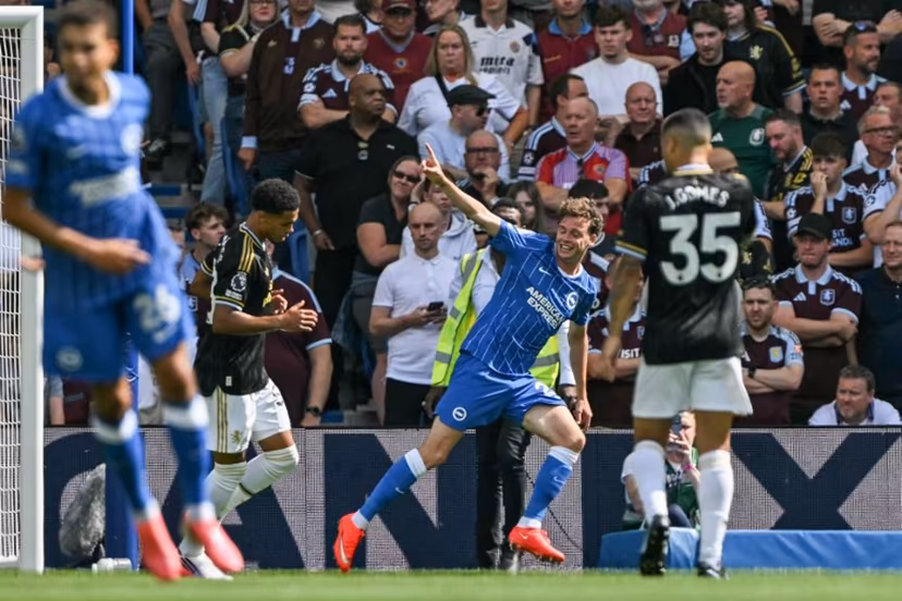 Brighton's Belgian defender #29 Maxim De Cuyper (C) celebrates after scoring the team's first goal during the English Premier League football match between Brighton and Hove Albion and Aston Villa at the American Express Community Stadium in Brighton, southern England on August 23, 2026. Glyn KIRK / AFP