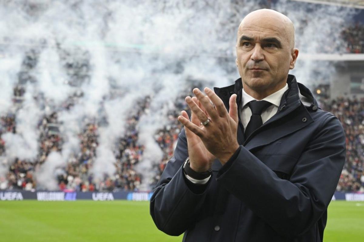 Portugal's Spanish coach Roberto Martinez claps before the 2026 World Cup qualifiers Europe zone group F football match between Portugal and Armenia, at Dragao stadium in Porto on November 16, 2025. Miguel RIOPA / AFP