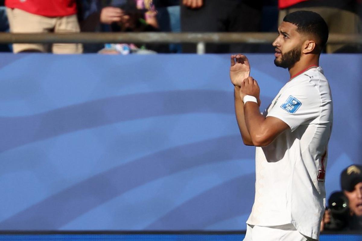 Morocco's midfielder #11 Ismael Saibari celebrates with after scoring his team's first goal during the 2026 World Cup Group C football match between Scotland and Morocco at the Boston Stadium in Foxborough on June 19, 2026. FRANCK FIFE / AFP
