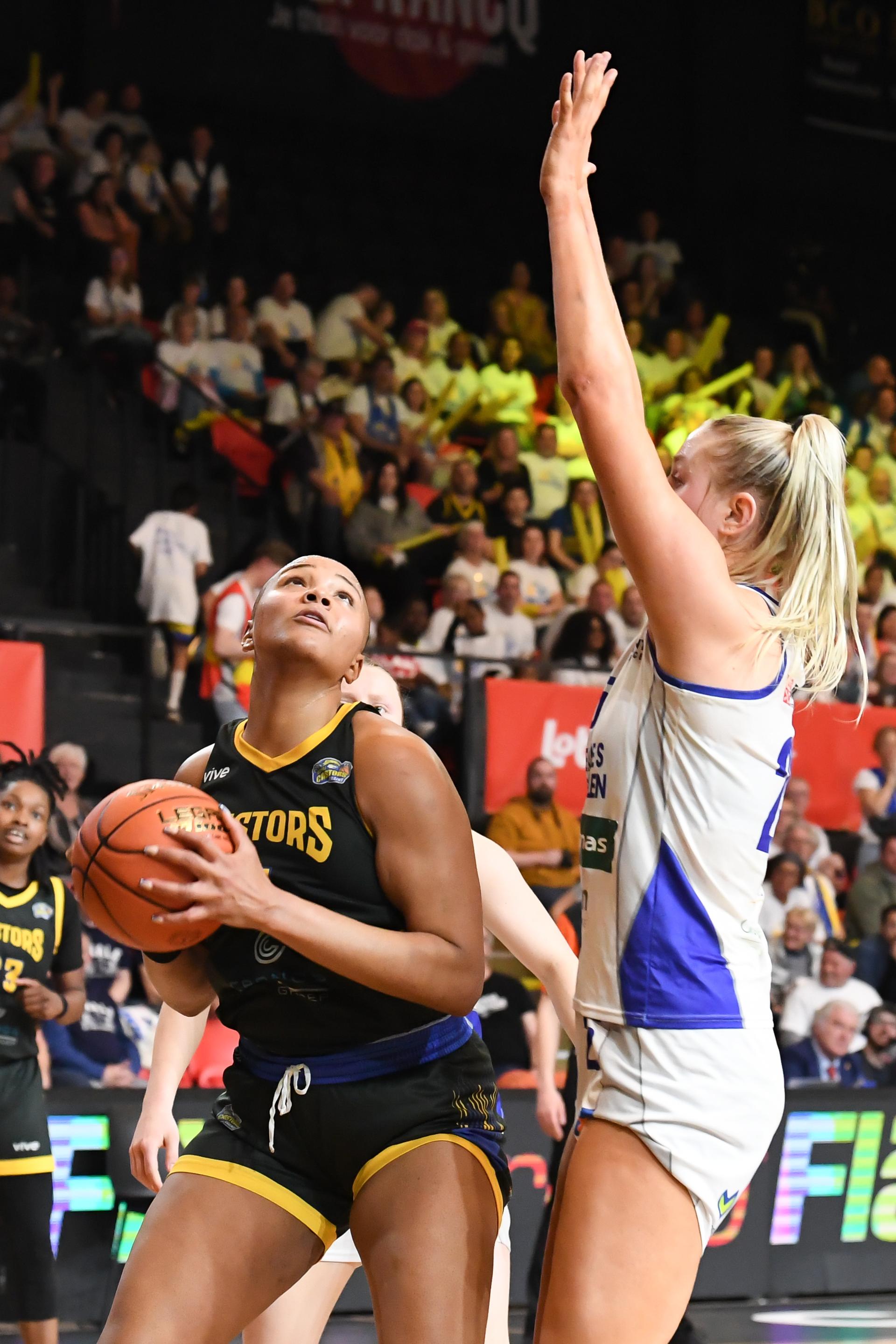 Castors' Jaquaya Miller and Mechelen's Cate Reese pictured in action during a basketball match between Kangoeroes Mechelen and Castors Braine, Saturday 08 March 2025 in Oostende, the final of the women's Belgian Basketball Cup. BELGA PHOTO JILL DELSAUX