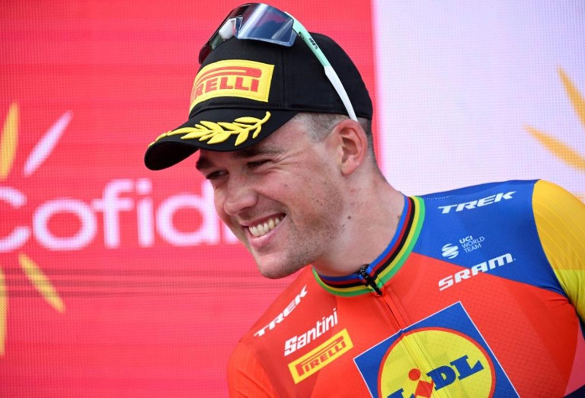 Stage winner Team Lidl-Trek's Danish rider Mads Pedersen celebrates on the podium after the 15th stage of the Vuelta a Espana cycling tour, a 167 km race between A Veiga/Vegaredo and Monforte de Lemos, on September 7, 2025. Miguel RIOPA / AFP