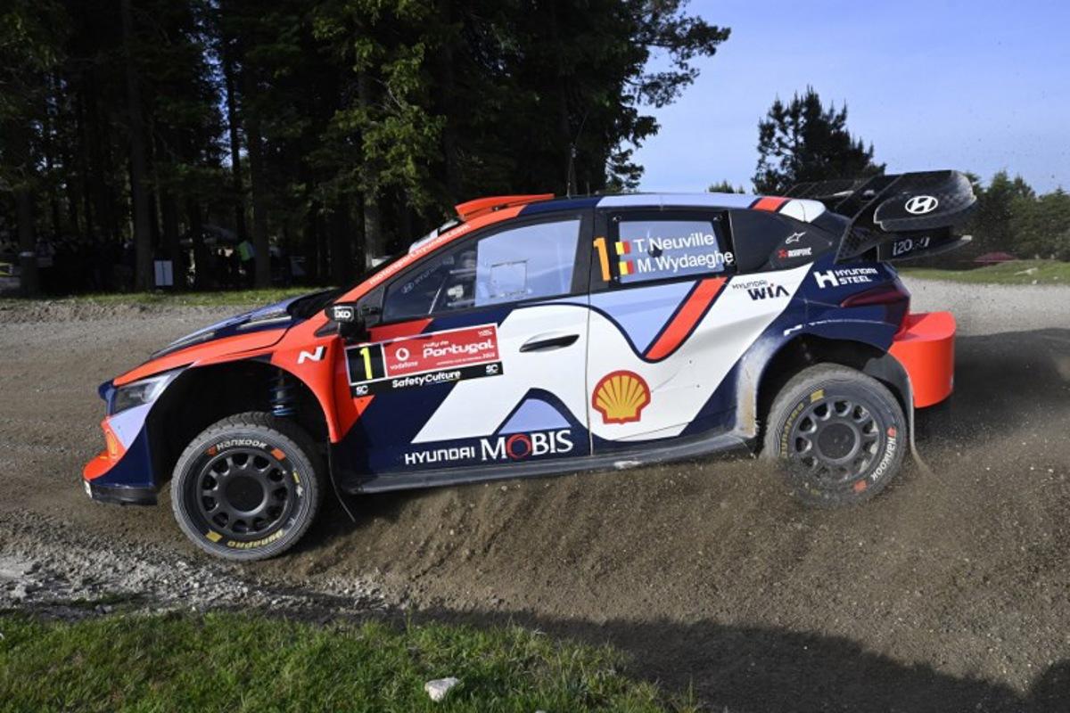 Thierry Neuville of Belgium and his co-driver Martijn Wydaeghe of Belgium compete in their Hyundai i20 compete during the SS12 stage of the World Rally Championship (WRC) Rally of Portugal in Vieira do Minho, on May 17, 2025. MIGUEL RIOPA / AFP