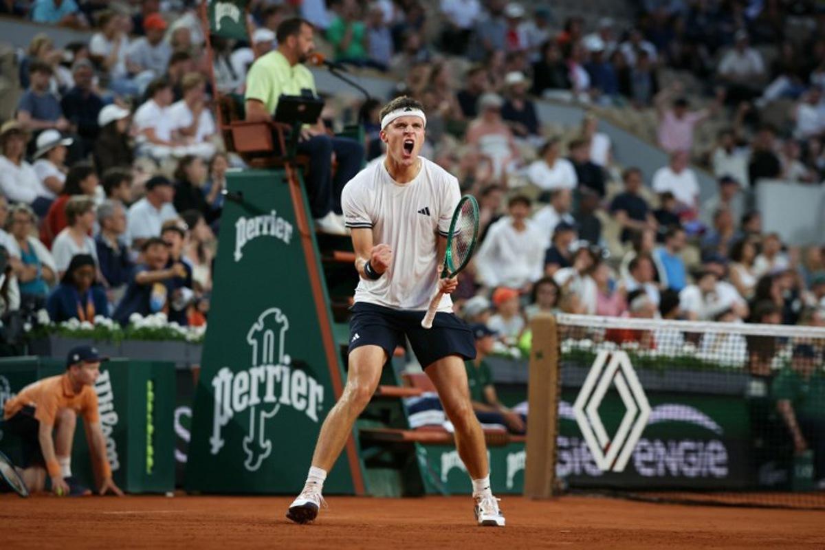 Czech Republic's Jakub Mensik reacts to a point against Andrey Rublev during their men's singles match on day 8 of the French Open tennis tournament on Court Suzanne-Lenglen at the Roland-Garros Complex in Paris on May 31, 2026. ALAIN JOCARD / AFP