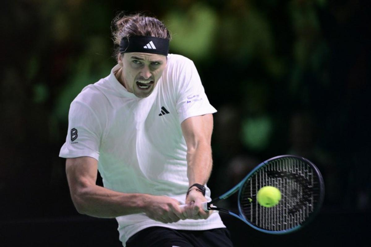 Germany's Alexander Zverev returns the ball to Argentina's Francisco Cerundolo during the Davis Cup men's singles quarter finals tennis match, at the Super Tennis Arena, in Bologna, northen Italy, on November 20, 2025. Tiziana FABI / AFP